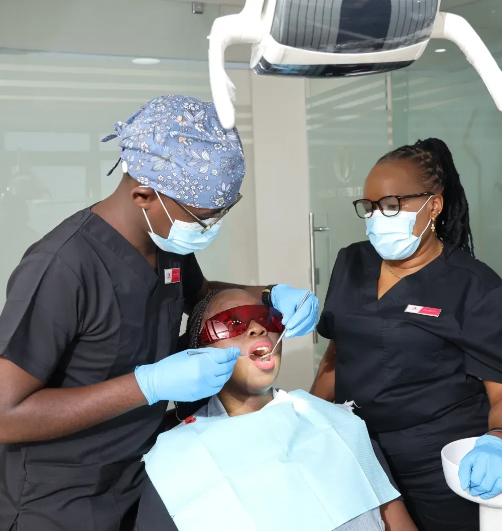 Dental staff team working on a patient